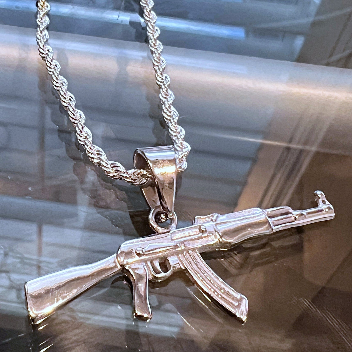 Silver ak 47 pendant hotsell